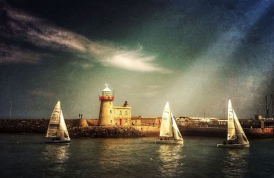 Boats sailing in sea