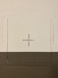 Close-up of text on wall