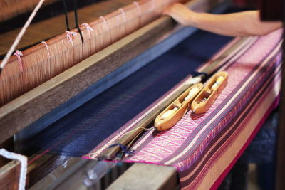 Close-up of clothes drying on wood