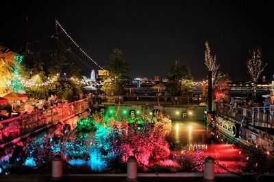 Firework display in city at night