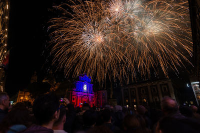 Firework display at night