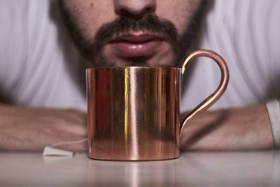 Close-up of a metallic mug