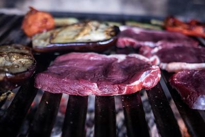 Close-up of meat on barbecue grill