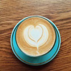 High angle view of cappuccino on table