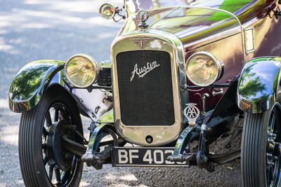 Close-up of vintage car on street