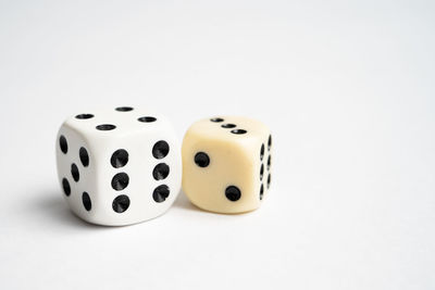 High angle view of coins on white background