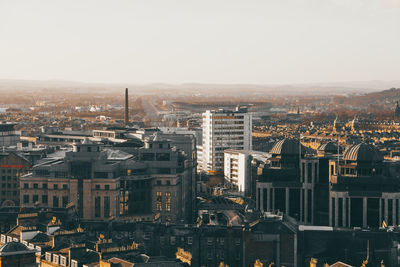 Aerial view of cityscape against clear sky