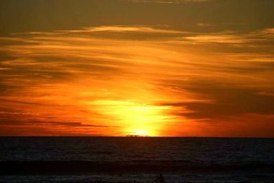 Scenic view of sea at sunset