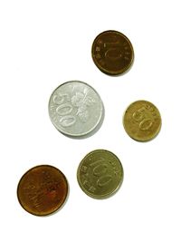 Close-up of coins on white background