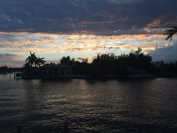 Scenic view of silhouette trees against sky during sunset