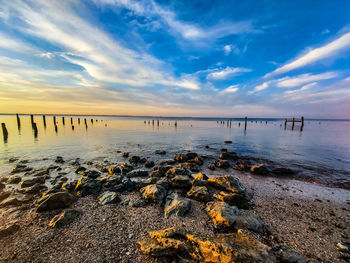 Scenic view of sea against sky during sunset