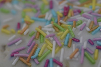 High angle view of multi colored candies on table