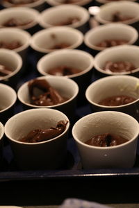 Food served in cups on tray