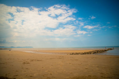 Scenic view of beach against sky