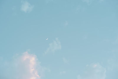 Low angle view of moon in sky