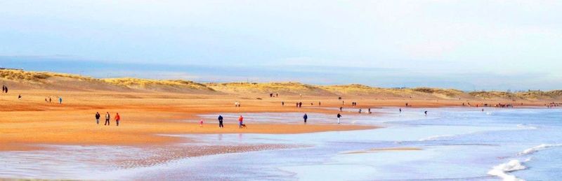 People enjoying at beach