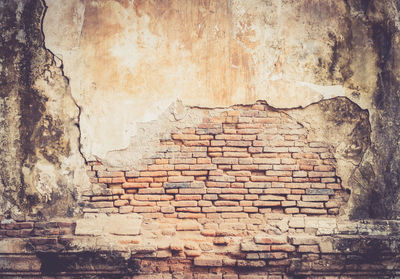 Full frame shot of weathered brick wall