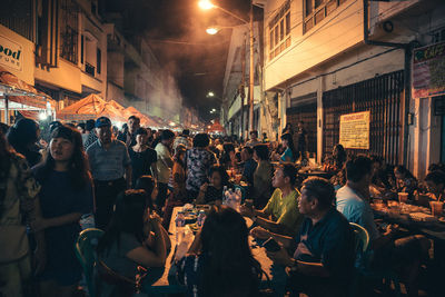 People on street at night