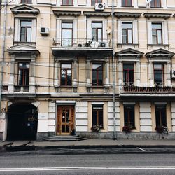 Building by street in city