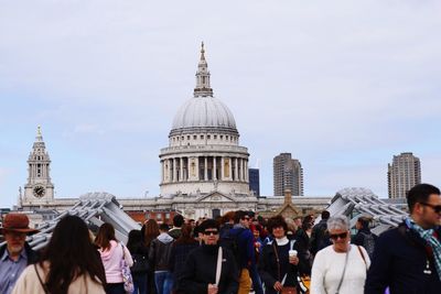 People at st paul cathedral against clear sky