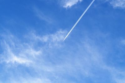 Low angle view of vapor trail in sky