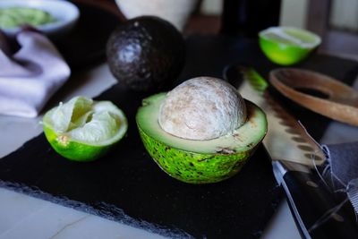 High angle view of fruits in plate on table
