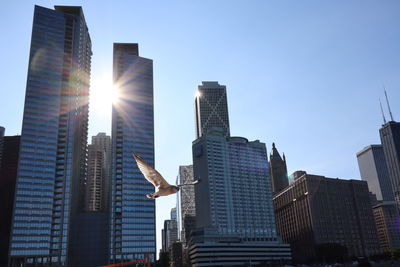 Low angle view of buildings in city against sky