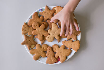 Close-up of hand holding cookies