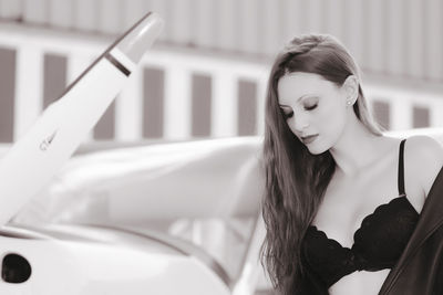 Young woman in car