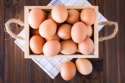 High angle view of eggs in container on table