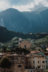 High angle view of townscape and mountains against sky