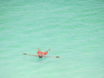 High angle view of person swimming in sea