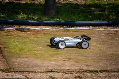 Close-up of toy car on field