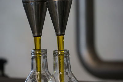 Close-up of beer glass bottle on table