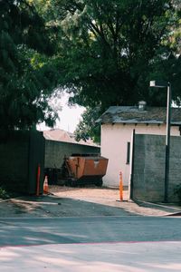 Houses by street in city