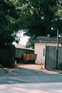 Houses by street in city