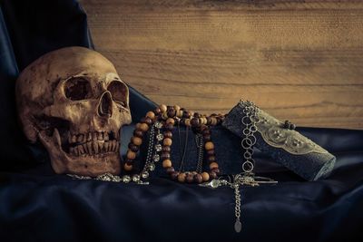 Close-up of human skull on table