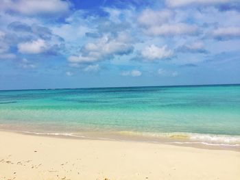 Scenic view of beach against sky