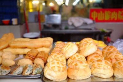 Close-up of breads for sale in store