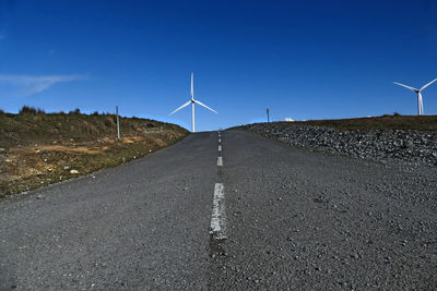 Windmills on countryside landscape