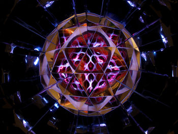 Close-up of illuminated lighting equipment at night
