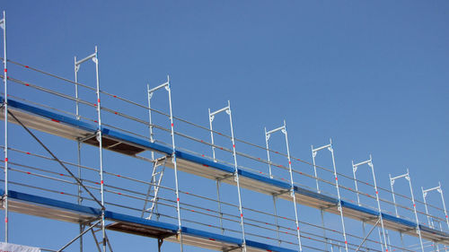 Low angle view of built structure against blue sky