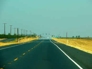 Road passing through empty road