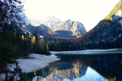 Scenic view of lake with mountains in background