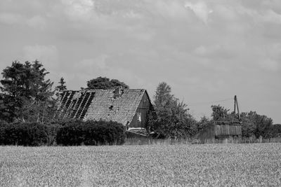 House on field against sky