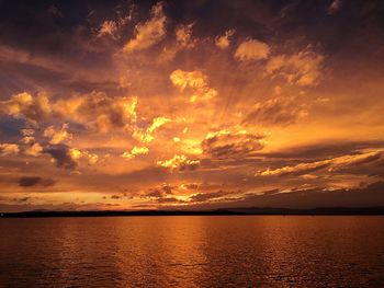 Scenic view of sea against dramatic sky