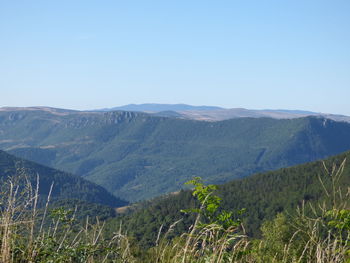 Scenic view of mountains against clear sky