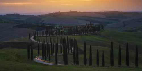 Scenic view of landscape against sky during sunset