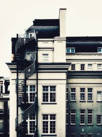 Low angle view of building during winter