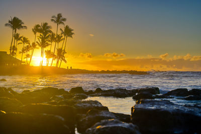 Scenic view of sea against sky during sunset